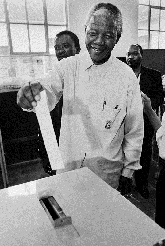 Nelson Mandela casts his vote in South Africa’s first free, nationwide elections, in 1994.